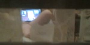 Spying on woman masturbating on cam