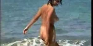 Big tits girl nude on the solitary beach