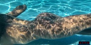 Ebony MILF model Ana Foxxx dips naked in a big pool and