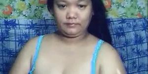 Busty Asian MILF rubs her pussy on webcam