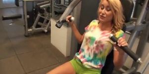 Sexy young blonde girl working out