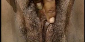 Black chick uses her knockers to massage a dick