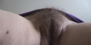 Busty hairy mature in tight shorts posing