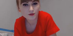 Sexy blonde teenager toying her wet pussy on web cam
