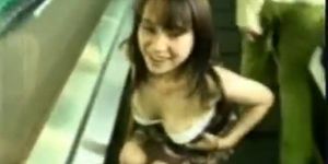 Shy Japanese Schoolgirl streaks in an airport