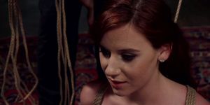 Redhead is anal fucked in bdsm threesome
