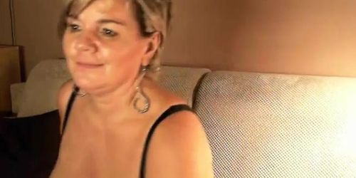 short haired german mature with big tits on her webcam