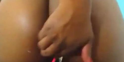 gourgeous black girl fists herself ass