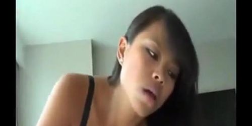 Hot asian girl sucking  rides a big white cock