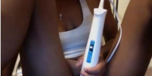 Vibrator on ebony pussy