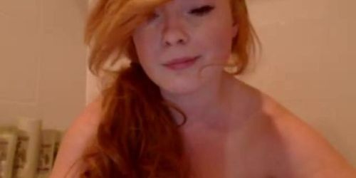 Redhead with a fat ass takes on a big dildo