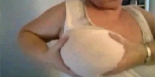 Mature Nancy playing with her boobs on webcam