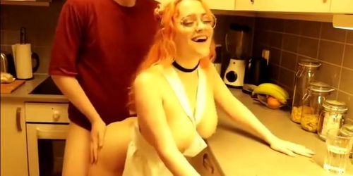 Amateur kitchen fucking with a big titty redhead