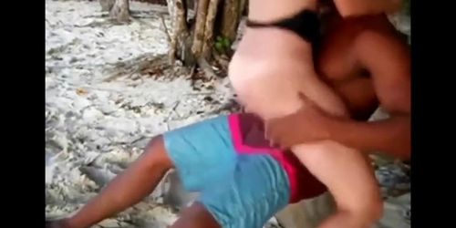 White girl fucks black guy on beach