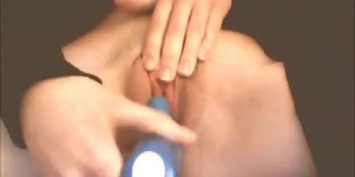 Brunette webcam girl fingers herself to orgasm