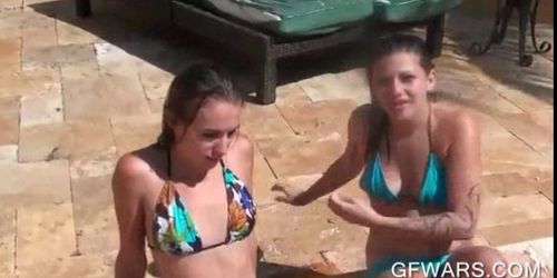 Horny college girls stripping naked in the pool