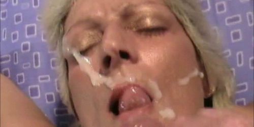 Naughty MILF takes a facial