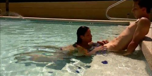 She sucks his cock in the pool