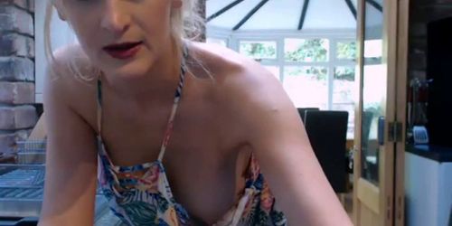 Blonde juicy jugs MILF with wireless vibrator on webcam