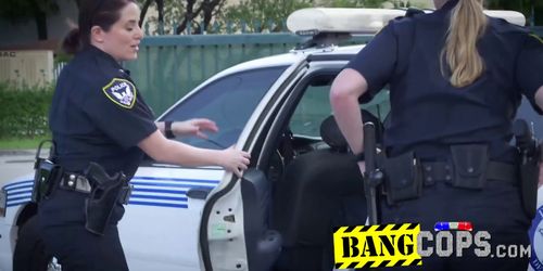 Horny dude screwing busty cops