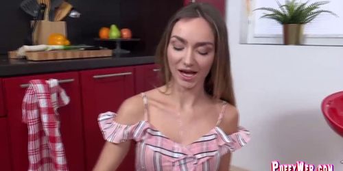 Long legged angel pissing herself in pantry