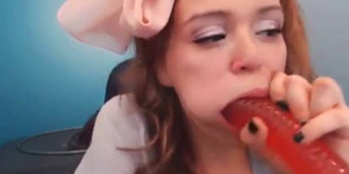 Hot redhead sucks dildo on webcam