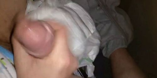 Twink cumming his wet diaper