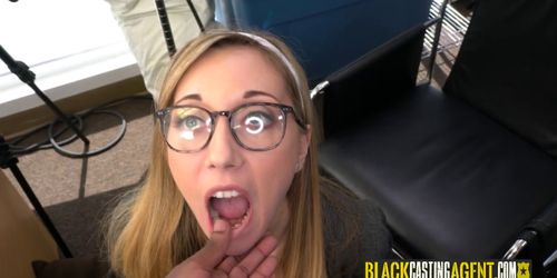 Horny teen is licking a black cock like a cocholate can