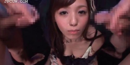 Teen japanese cutie blowing two dicks gets facialized