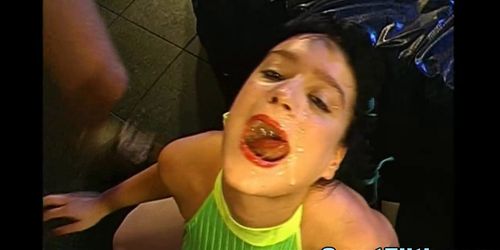 Bukkake slut drinks cum