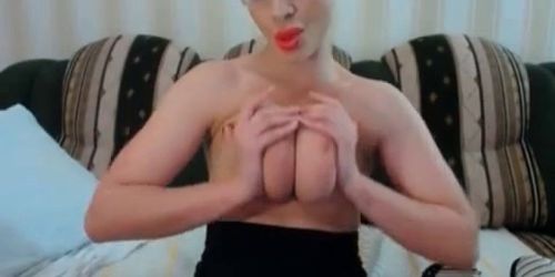 Huge Natural Tits Plays with Dildo