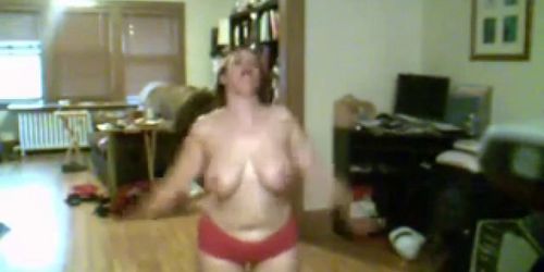 Big Breasted amateur dancing and teasing topless