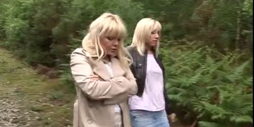 Two blonde MILFs suck off stranger in forest