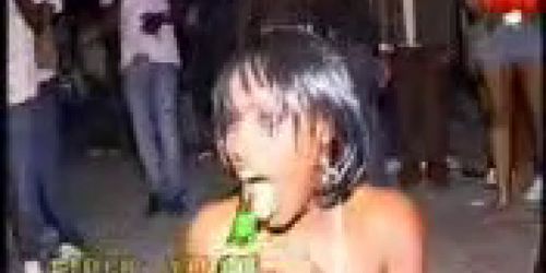 Ebony chick masturbates with bottle in public with an a