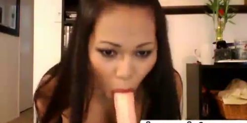 Hot asian sucks her toy