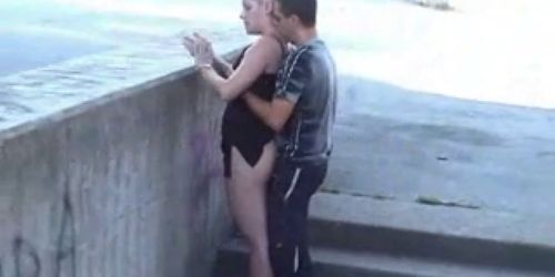 a couple takes pleasure in front of people