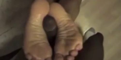 Black cum on white feets