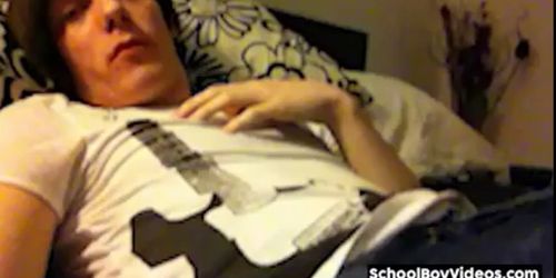 Gay teen has a play with his uncut dick