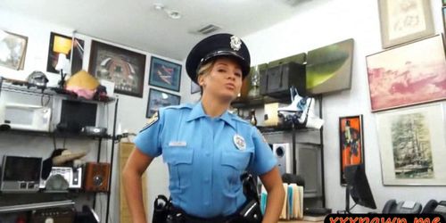 Busty police officer pawns her weapon and fucked by paw