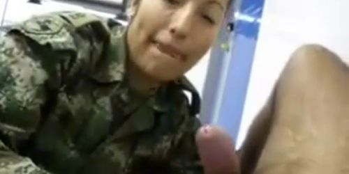 Asian horny female soldier sucking and swallow