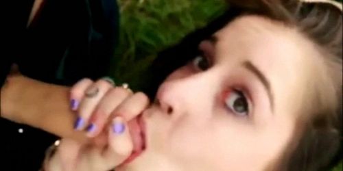 Teen beauty sucking cock - outdoors