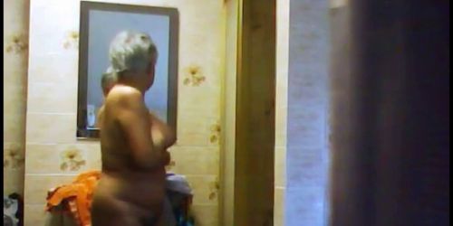 My Granny caught by spy camera in bathroom