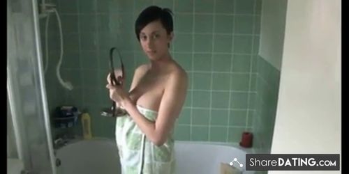 Kims boobs slip out of her towel