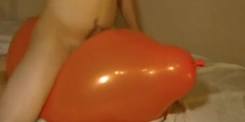 Big inflatable orange balloon humping cum