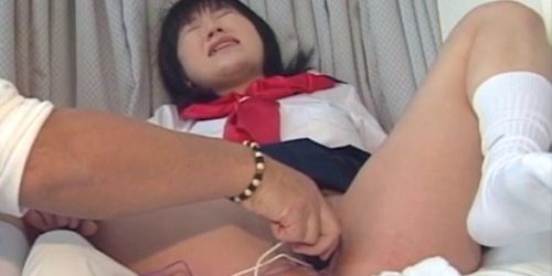 Brunette Asian in school fills her mouth with loaded pe