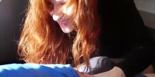 Natural redhead gives a blowjob after workout session