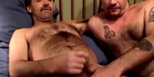 Masturbating gay guy receives a facial