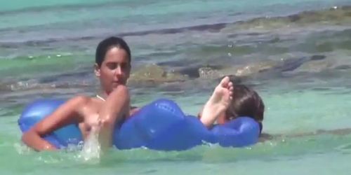 Teen girls having fun on the beach