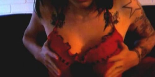 Horny emo cam girl caressing her tits