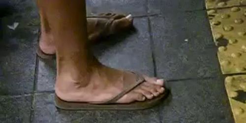 Big Puerto Rican Feet on Train..